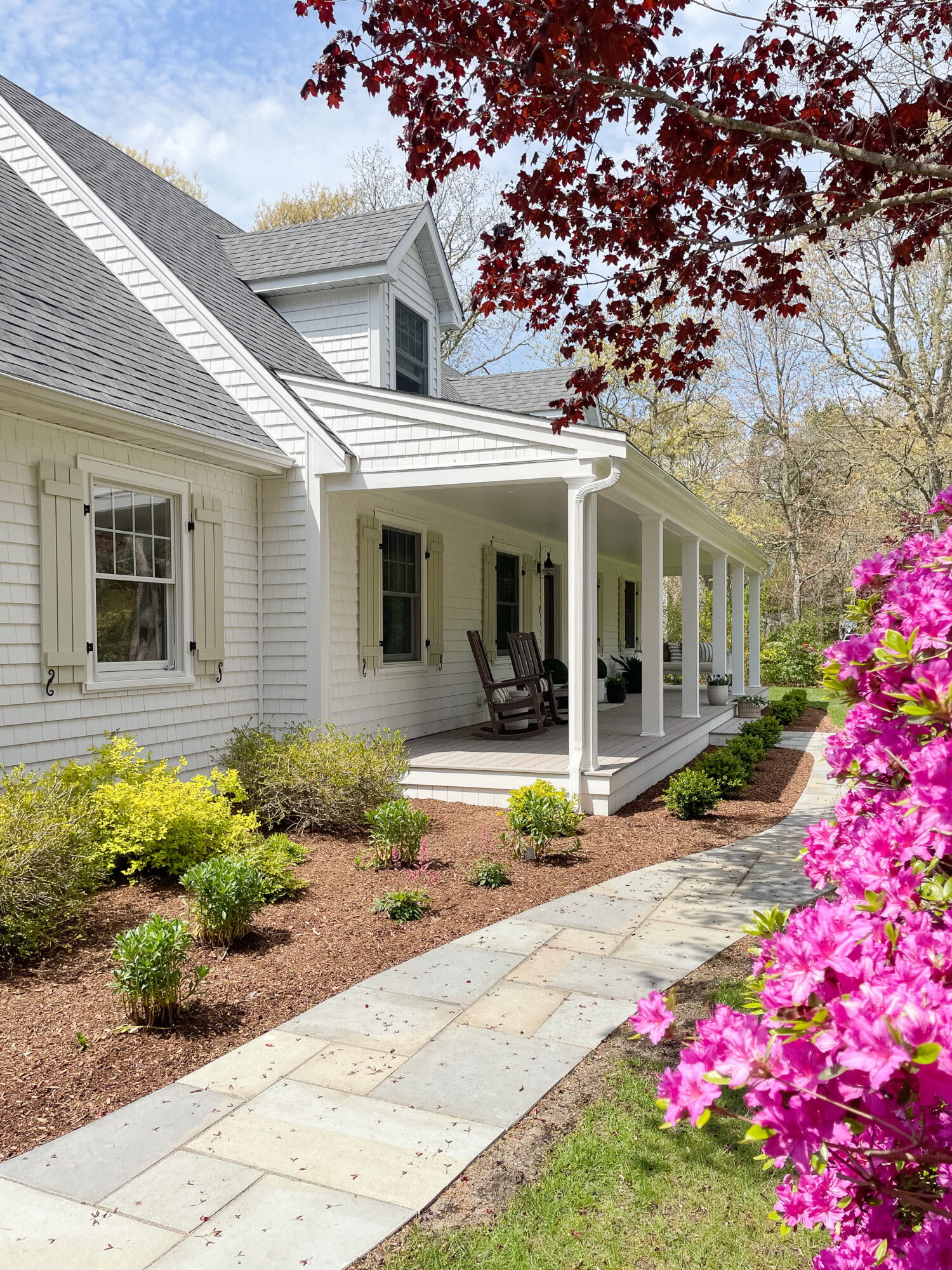 spring front porch styling | spring, spring front porch, spring home, home decor, front porch, walkway, blue stone, outdoor seating, spring flowers