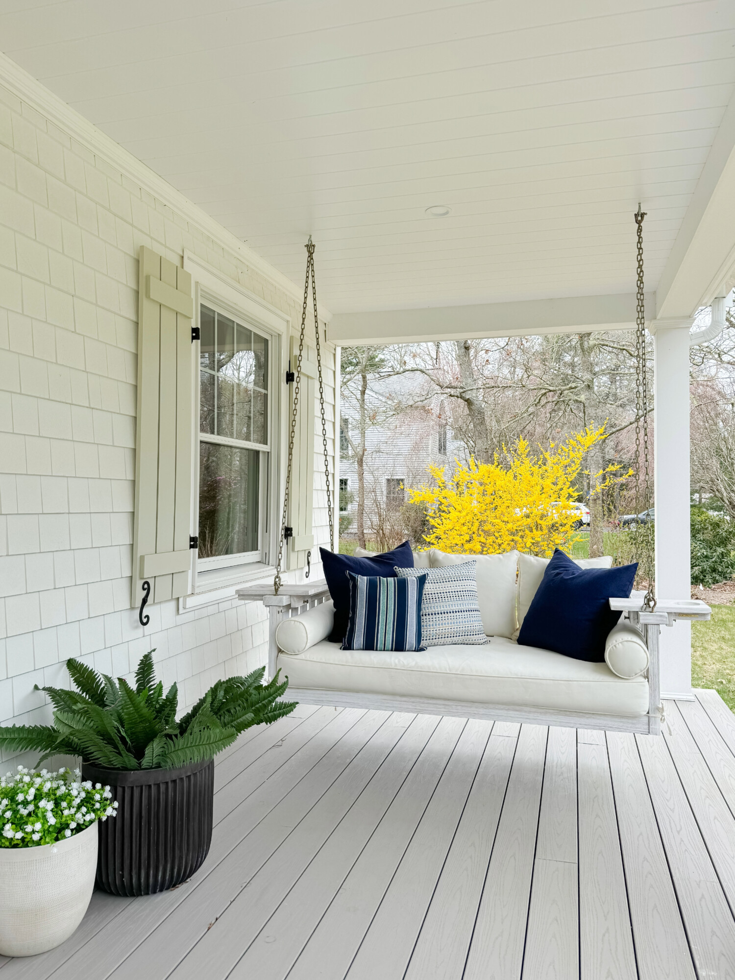 spring patio, beige patio, coastal patio, patio furniture, porch swing