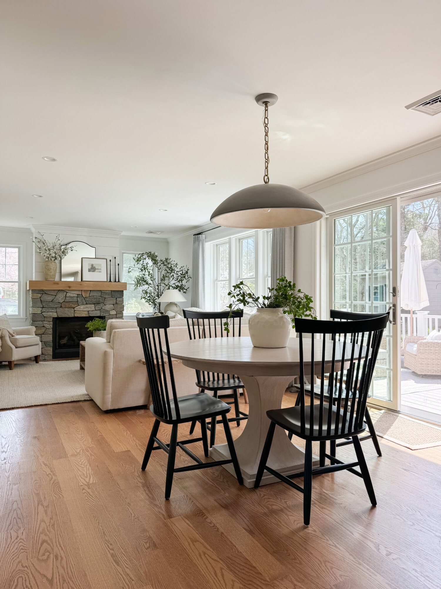 colonial chairs with english table in coastal home