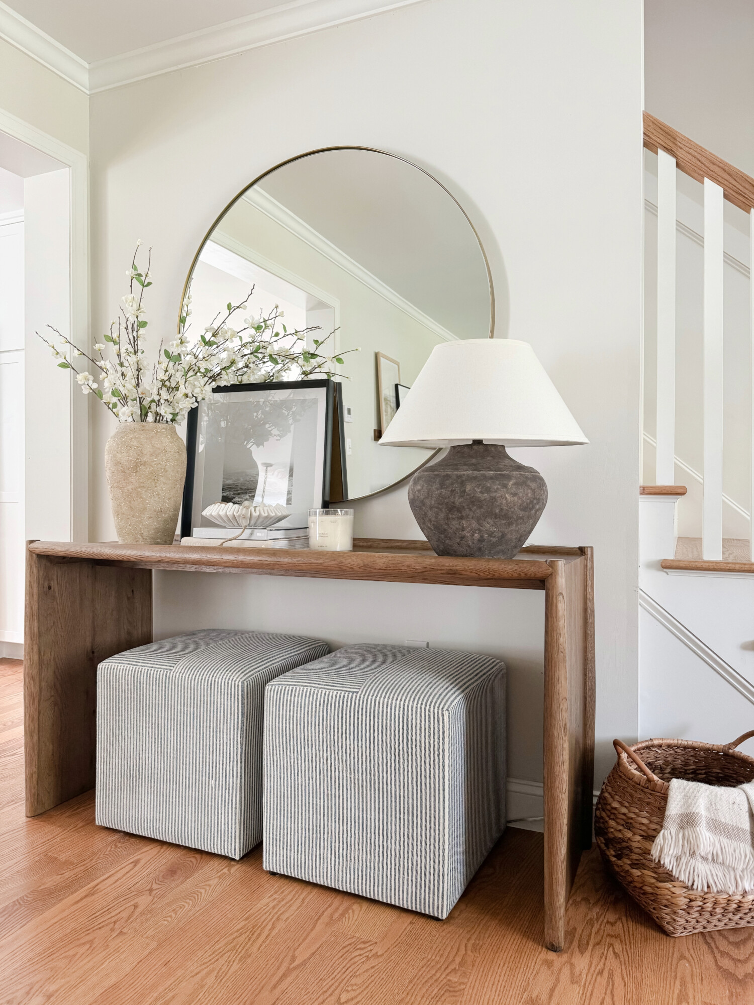 wood console table in modern coastal beige home