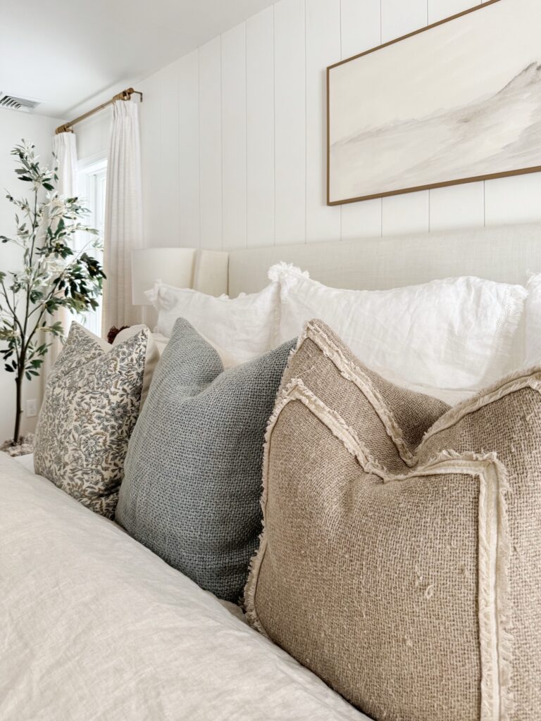 throw pillows on a bed